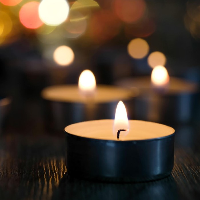 Candle light and bokeh background in the darkness with space